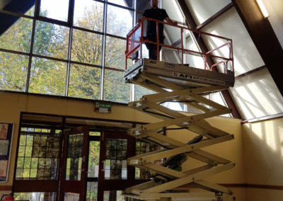 scissor lift being used to help paint ceilings near Belper, Derbyshire